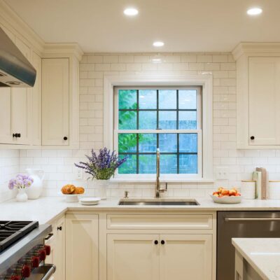 PERIMETER: Wood: Maple; Paint color: White Flour; Door Style: Cornish; Face Frame: Square Inset; ISLAND: Wood: Maple; Paint color: Ellie Gray; Door Style: Cornish; Face Frame: Square Inset