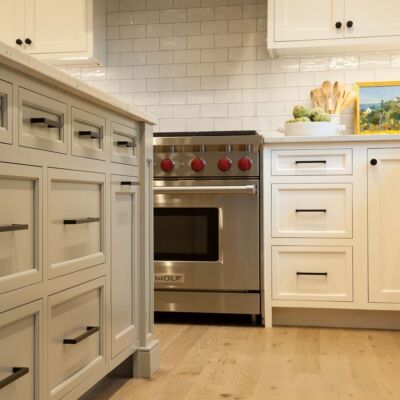 PERIMETER: Wood: Maple; Paint color: White Flour; Door Style: Cornish; Face Frame: Square Inset; ISLAND: Wood: Maple; Paint color: Ellie Gray; Door Style: Cornish; Face Frame: Square Inset