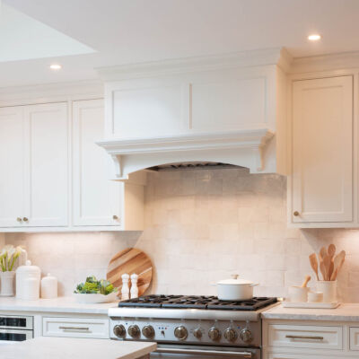 PERIMETER: Wood: Maple; Paint color: White Flour; Door Style: Cornish; Face Frame: Beaded Inset; ISLAND: Wood: Flat Sawn White Oak; Finish: Oceanside; Door Style: Cornish; Face Frame: Beaded Inset