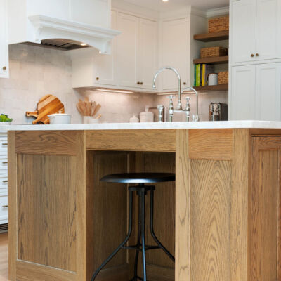 PERIMETER: Wood: Maple; Paint color: White Flour; Door Style: Cornish; Face Frame: Beaded Inset; ISLAND: Wood: Flat Sawn White Oak; Finish: Oceanside; Door Style: Cornish; Face Frame: Beaded Inset