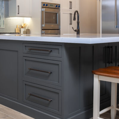 PERIMETER: Wood: Maple; Paint color: White Flour; Door Style: Enfield; Face Frame: Square Inset; ISLAND: Wood: Maple; Paint color: Peppercorn; Door Style: Enfield; Face Frame: Square Inset PERIMETER: Wood: Maple; Paint color: White Flour; Door Style: Enfield; Face Frame: Square Inset; ISLAND: Wood: Maple; Paint color: Peppercorn; Door Style: Enfield; Face Frame: Square Inset