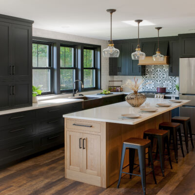 PERIMETER: Wood: Maple; Paint color: Black of Night; Door Style: Exeter; Face Frame: Square Inset; ISLAND: Wood: Cherry; Finish: Summer Haze; Door Style: Exeter; Face Frame: Square Inset (NOTE: RANGE HOOD CRAFTED FROM CROWN POINT LINE)