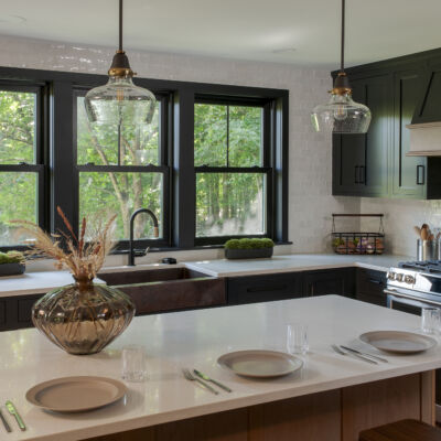 PERIMETER: Wood: Maple; Paint color: Black of Night; Door Style: Exeter; Face Frame: Square Inset; ISLAND: Wood: Cherry; Finish: Summer Haze; Door Style: Exeter; Face Frame: Square Inset
(NOTE: RANGE HOOD CRAFTED FROM CROWN POINT LINE) PERIMETER: Wood: Maple; Paint color: Black of Night; Door Style: Exeter; Face Frame: Square Inset; ISLAND: Wood: Cherry; Finish: Summer Haze; Door Style: Exeter; Face Frame: Square Inset (NOTE: RANGE HOOD CRAFTED FROM CROWN POINT LINE)