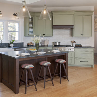 PERIMETER: Wood: Maple; Paint color: Green Earth; Door Style: Cornish; Face Frame: Beaded Inset; ISLAND: Wood: Cherry; Finish: Chestnut; Door Style: Cornish; Face Frame: Beaded Inset (NOTE: RANGE HOOD CRAFTED FROM CROWN POINT LINE)