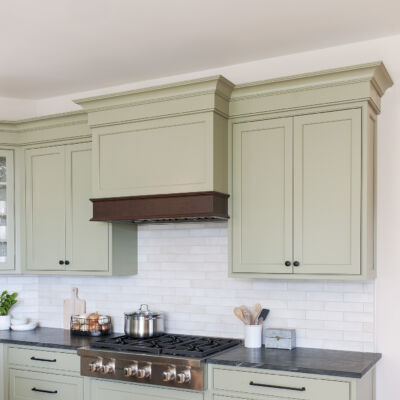 PERIMETER: Wood: Maple; Paint color: Green Earth; Door Style: Cornish; Face Frame: Beaded Inset (NOTE: RANGE HOOD CRAFTED FROM CROWN POINT LINE)