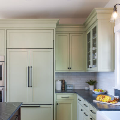 PERIMETER: Wood: Maple; Paint color: Green Earth; Door Style: Cornish; Face Frame: Beaded Inset; ISLAND: Wood: Cherry; Finish: Chestnut; Door Style: Cornish; Face Frame: Beaded Inset