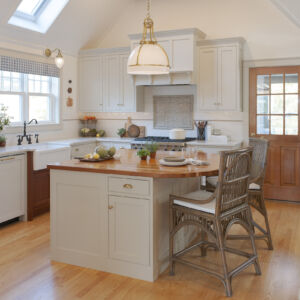 PERIMETER: Wood: Maple; Paint color: Accessible Beige; Door Style: Enfield; Face Frame: Square Inset; SINK BASE: Wood: Cherry; Finish: Candlelight; Door Style: Enfield; Face Frame: Square Inset